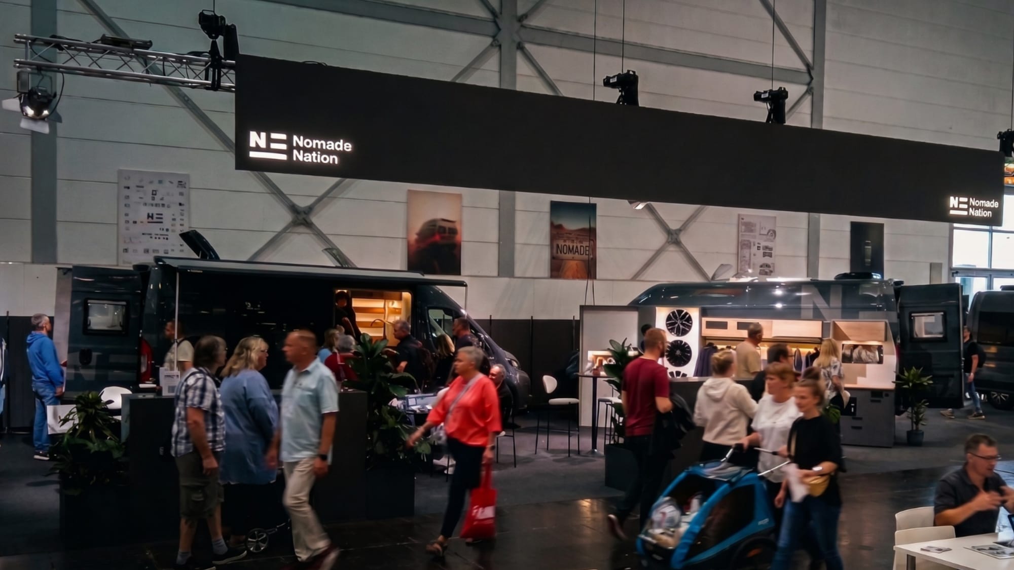 Visitors at the Nomade Nation stand at the Caravan Salon in Düsseldorf