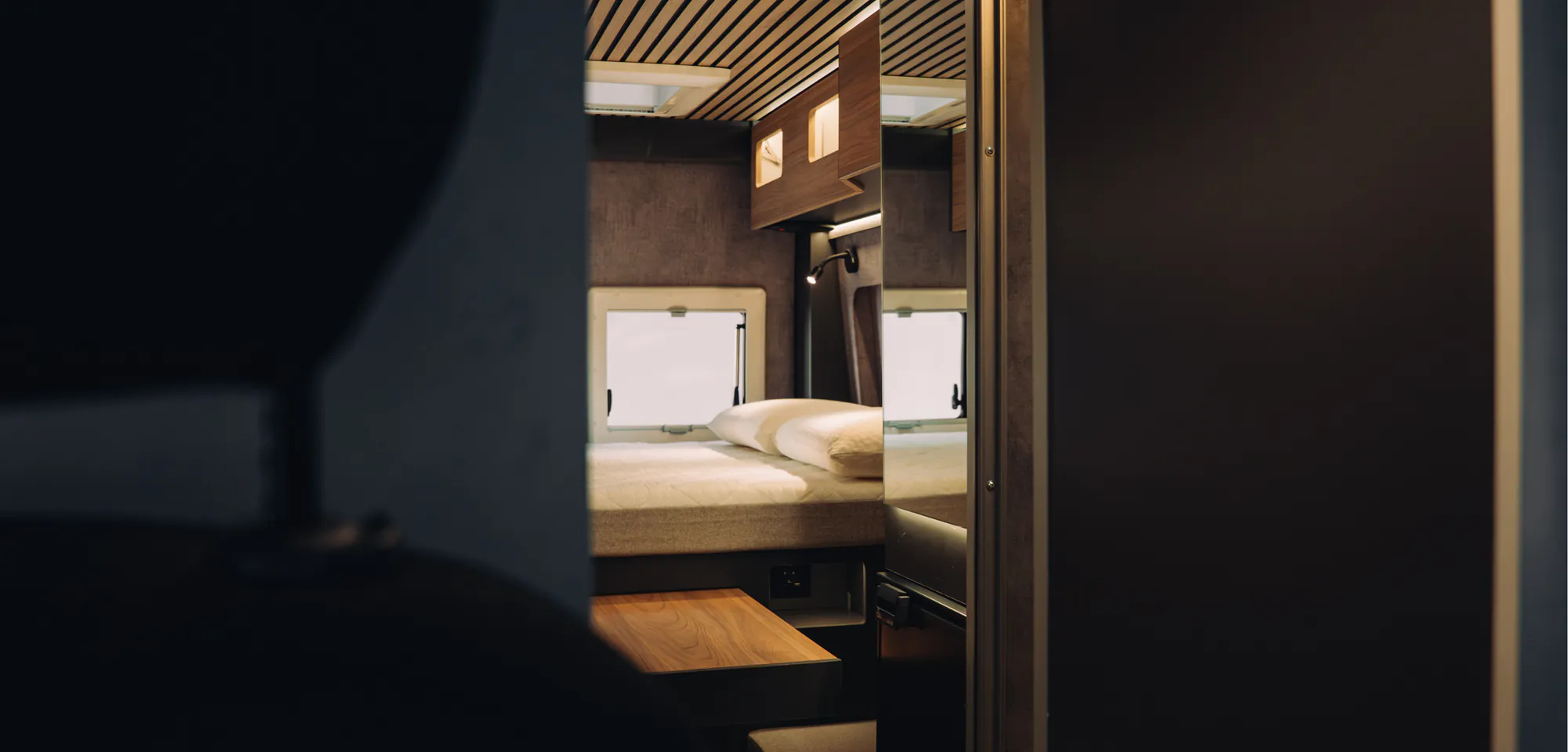 The Neo S's interior from the bedroom towards the kitchen