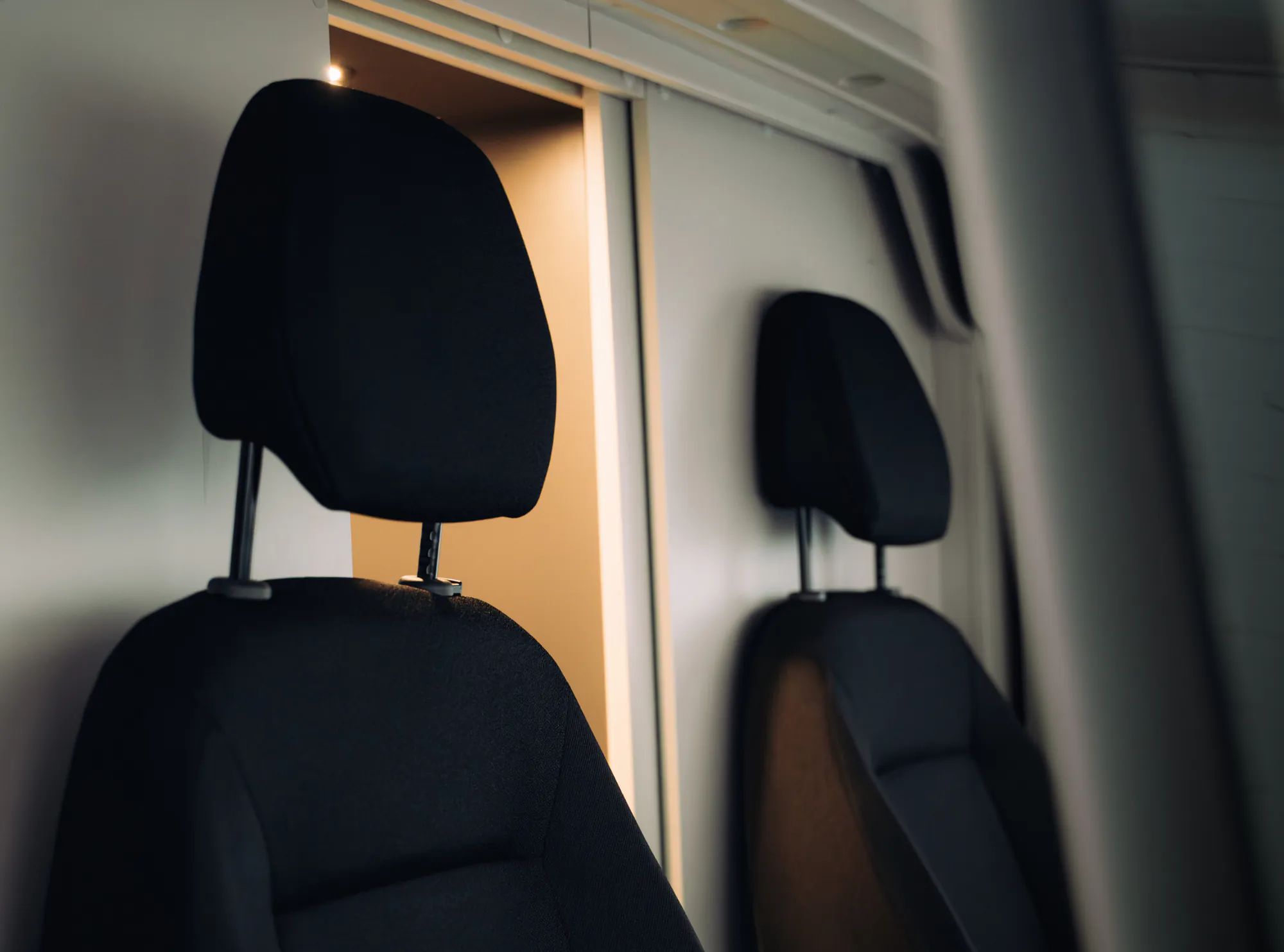 The two seats of the Space S's cab, seen from the living area