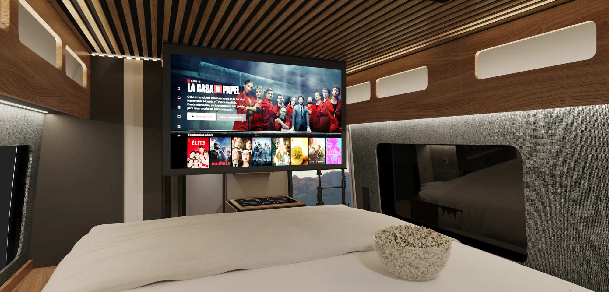The Space S's Cinema Pack with the screen unfolded over the bed